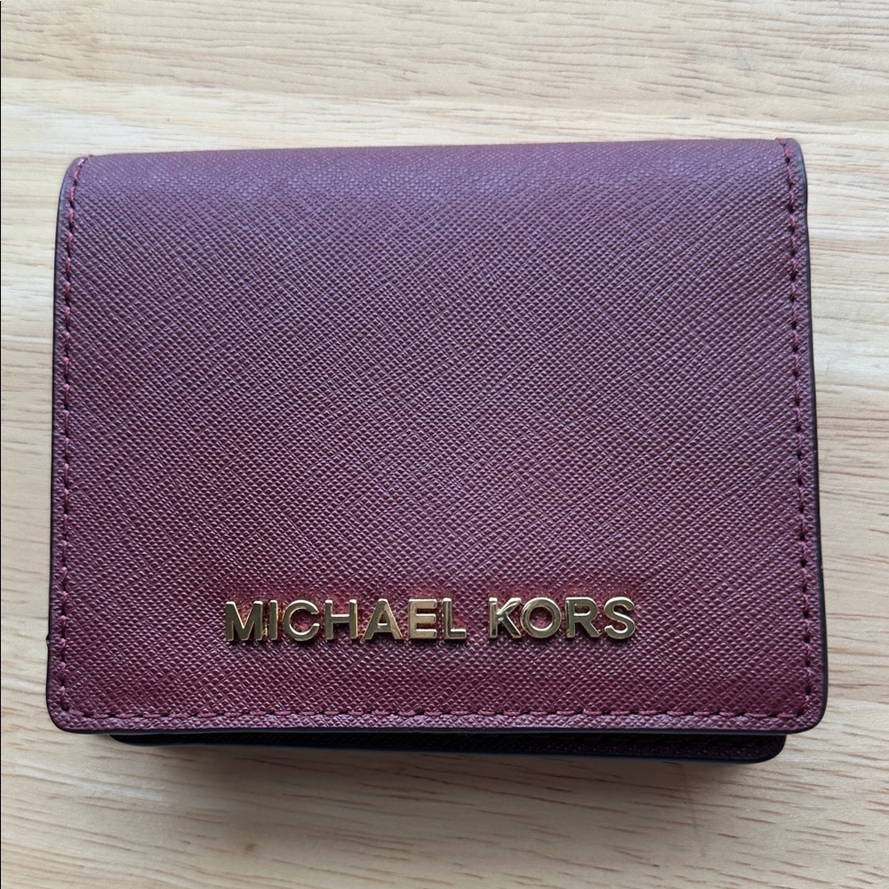 Michael Kors Plum Wallet with Gold Accents